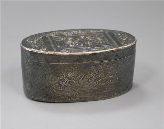 An 18th century French embossed oval white metal snuff box, 81mm.